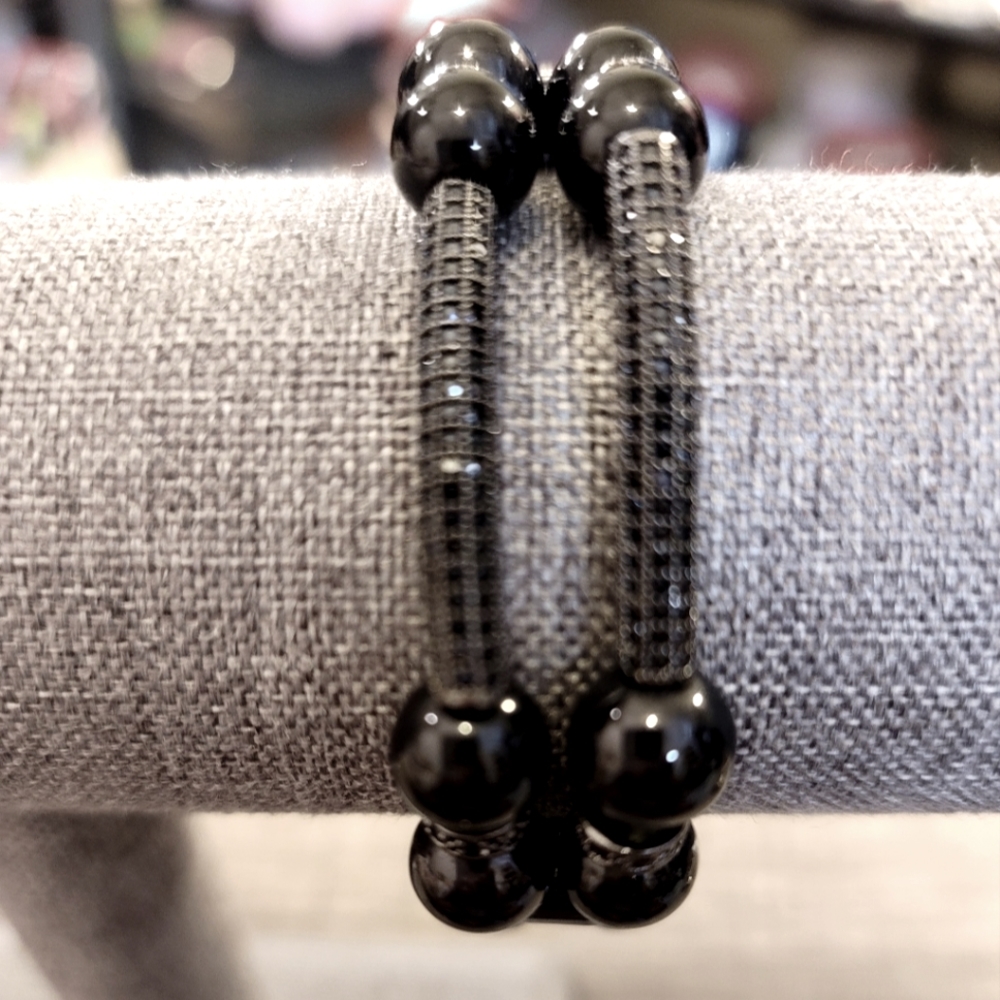 Handmade double stranded stretch bracelet. Pave stones and black beads